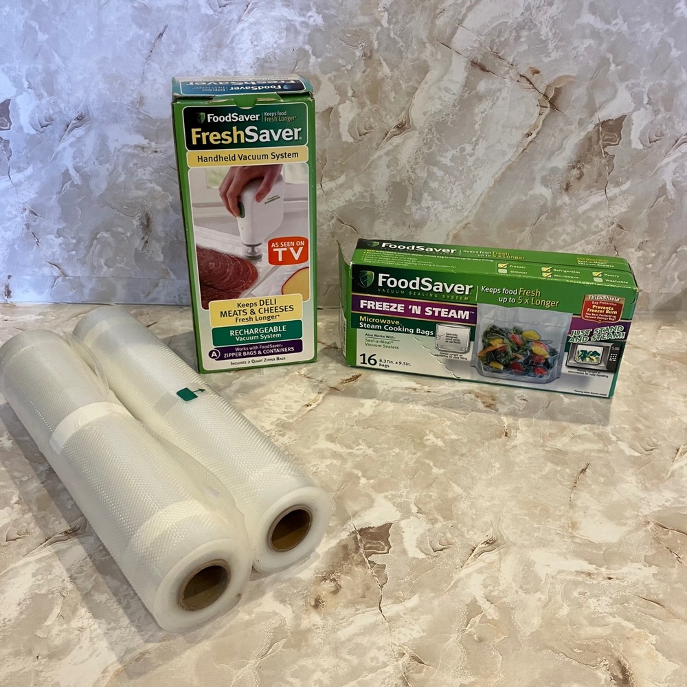 FoodSaver FreshSaver Handheld Vacuum Sealer Bundle with Steam Bags and Rolls
